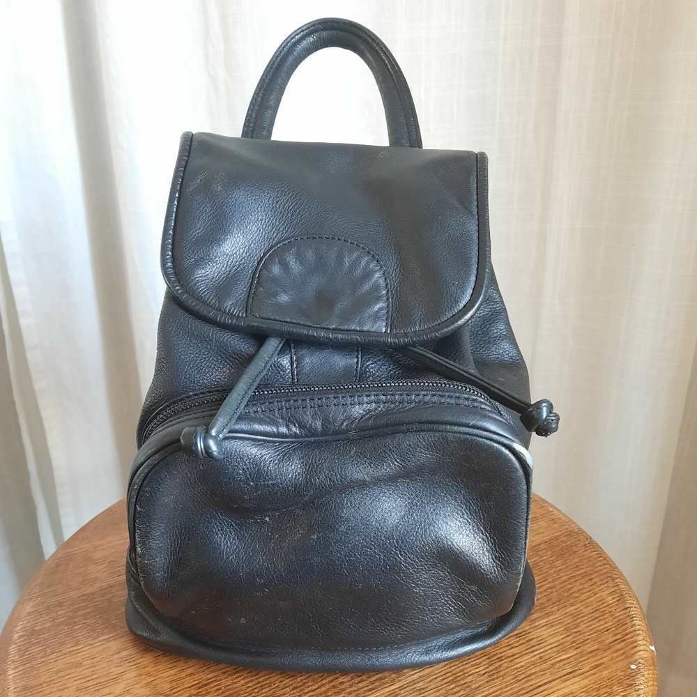 Black leather mini backpack with gold hardware